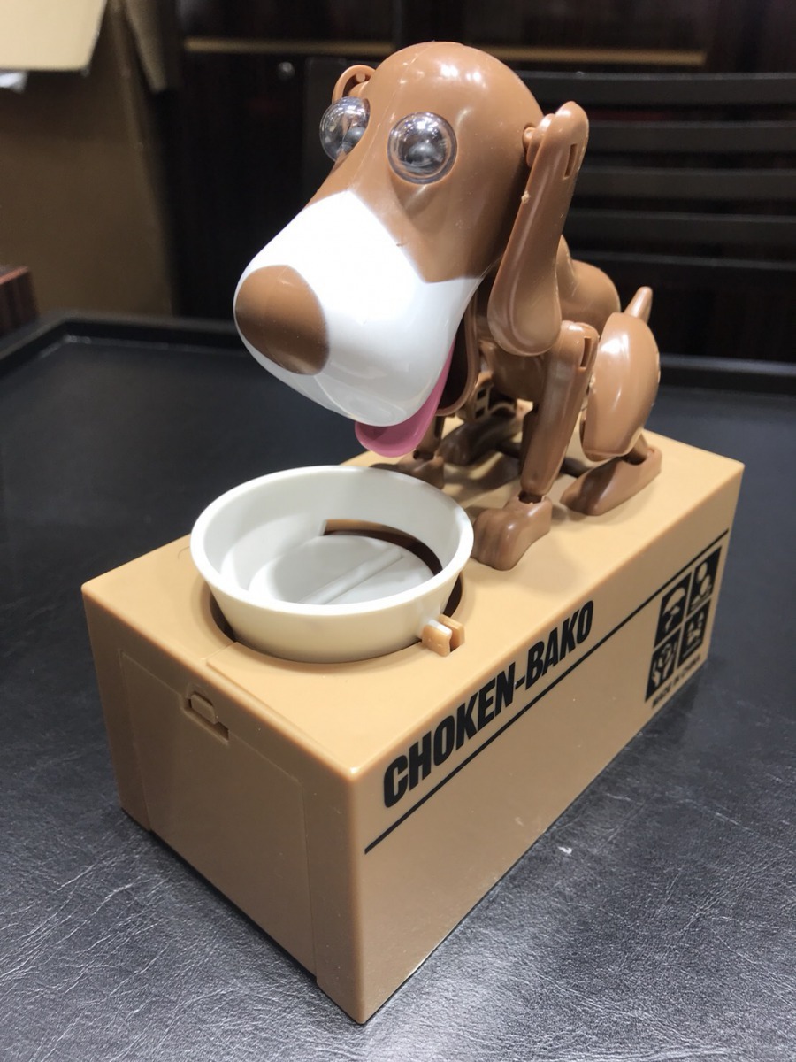 銀樓業者推出「咬錢狗」贈品。高維奇/攝