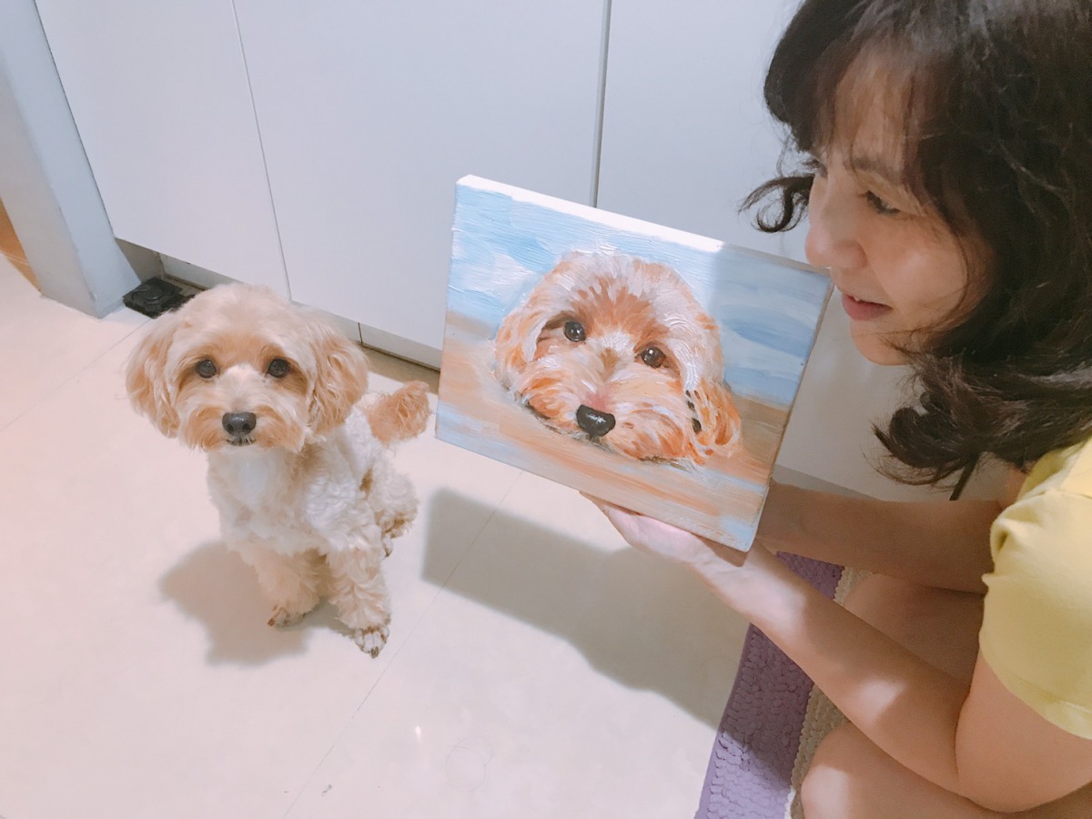 周芳如和小乖要參加台南市動保處舉辦的「2018毛孩親子臉暨造型趣味賽」。圖/台南市動保處提供