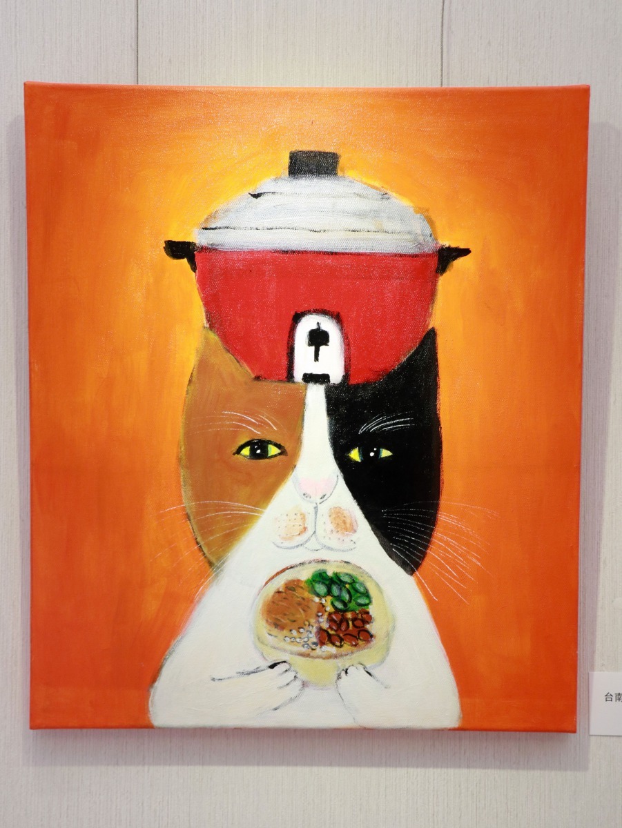 「吃台南米糕的貓」，畫的就是愛上台南米糕的PEPE桑自己。高維奇/攝