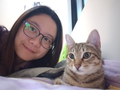 與鏟屎官一起合影的「米糕」。新北市動保處/提供