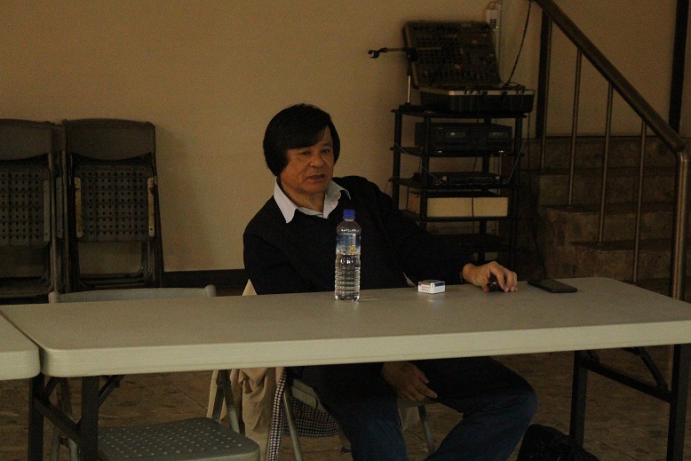 程一駿教授於生態保育講座向民眾解說海龜的處境。 姚崇仁/攝